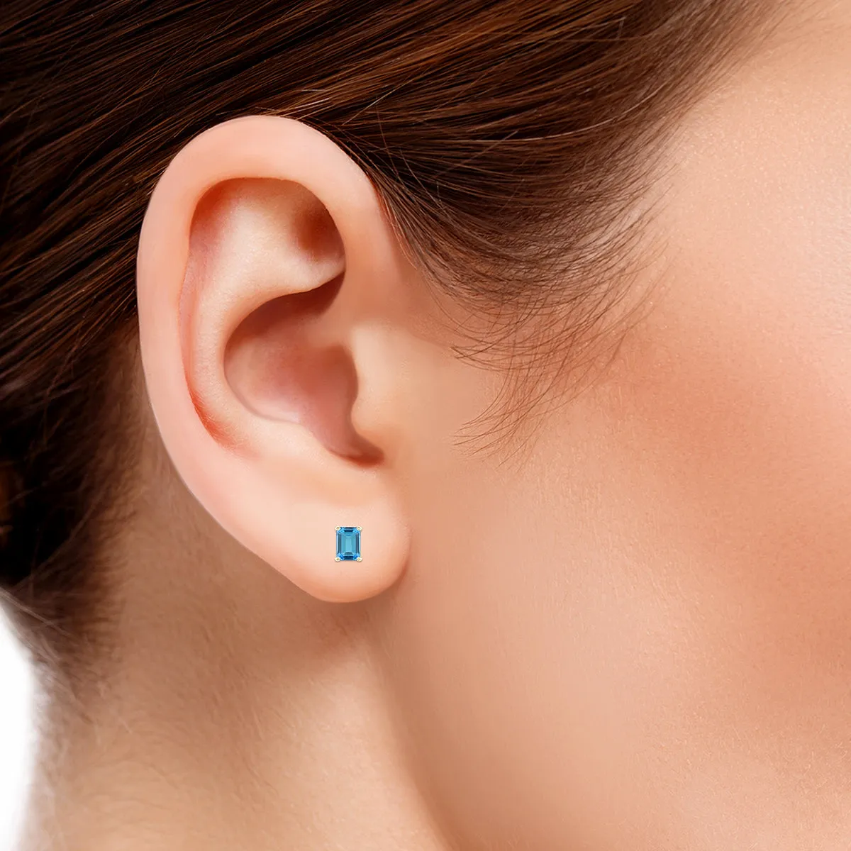 14K Yellow Gold 7X5Mm Emerald Shaped Blue Topaz Earrings