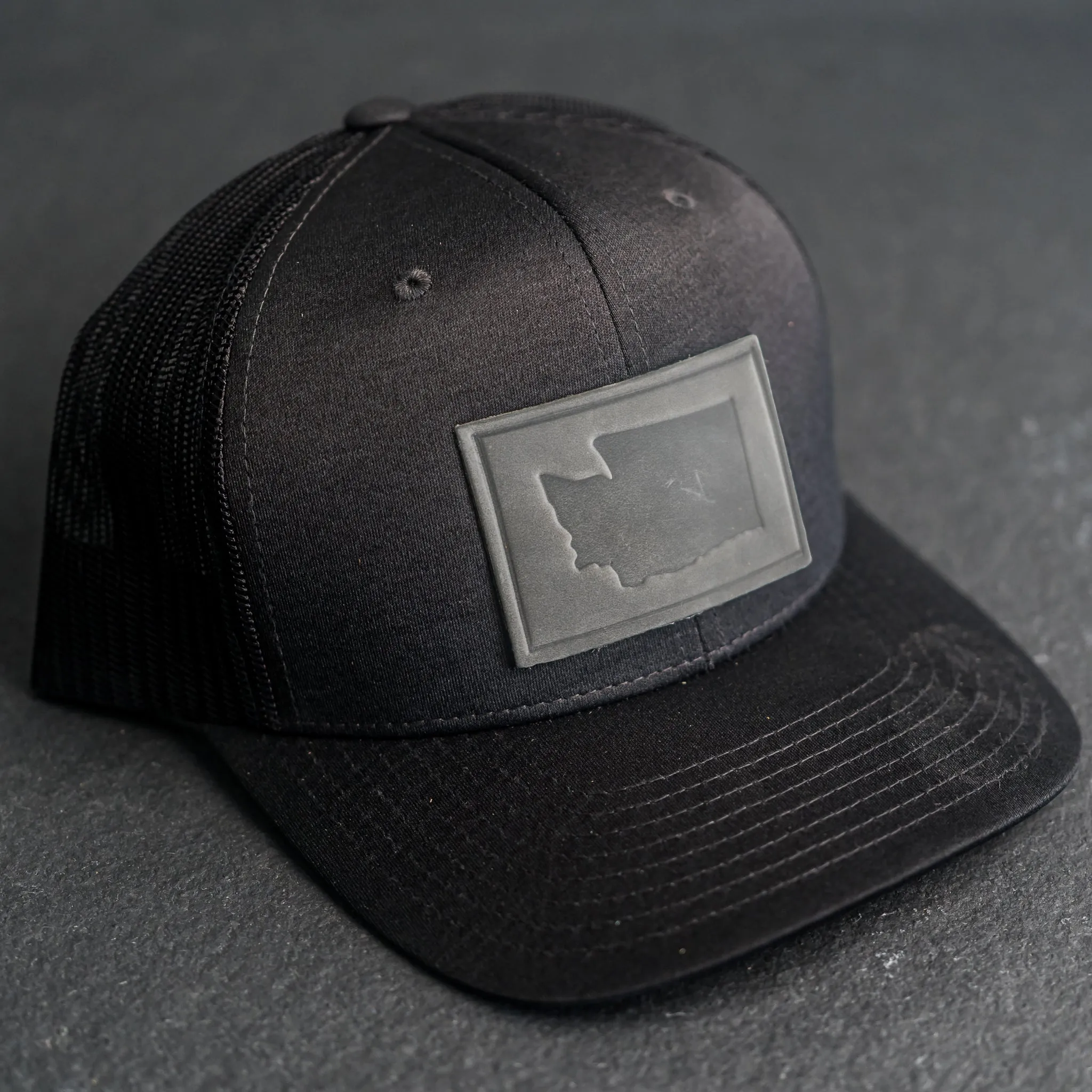 Leather Patch Performance Style Trucker Hat - Washington Stamp