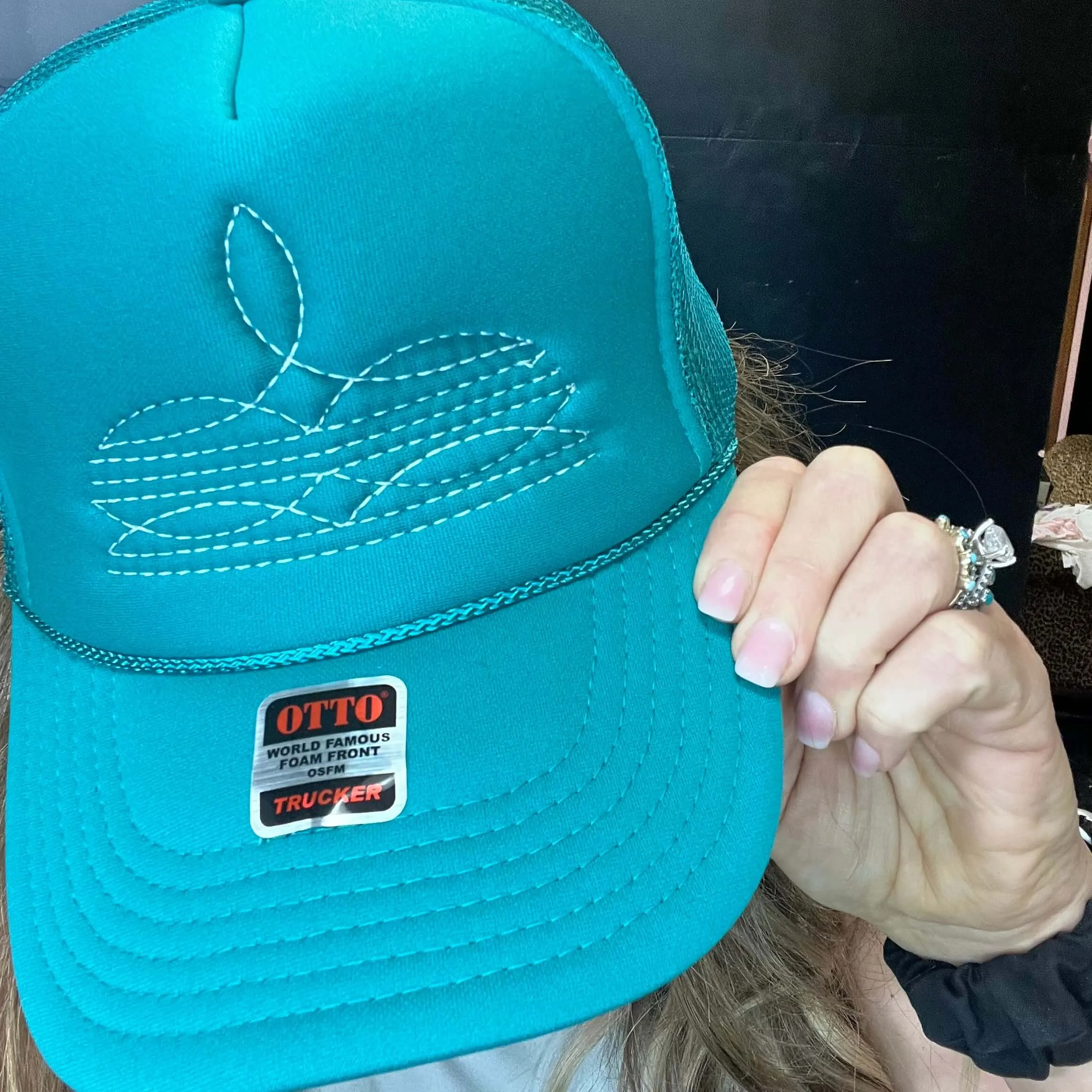 White on Turquoise Boot Stitch Trucker Hat